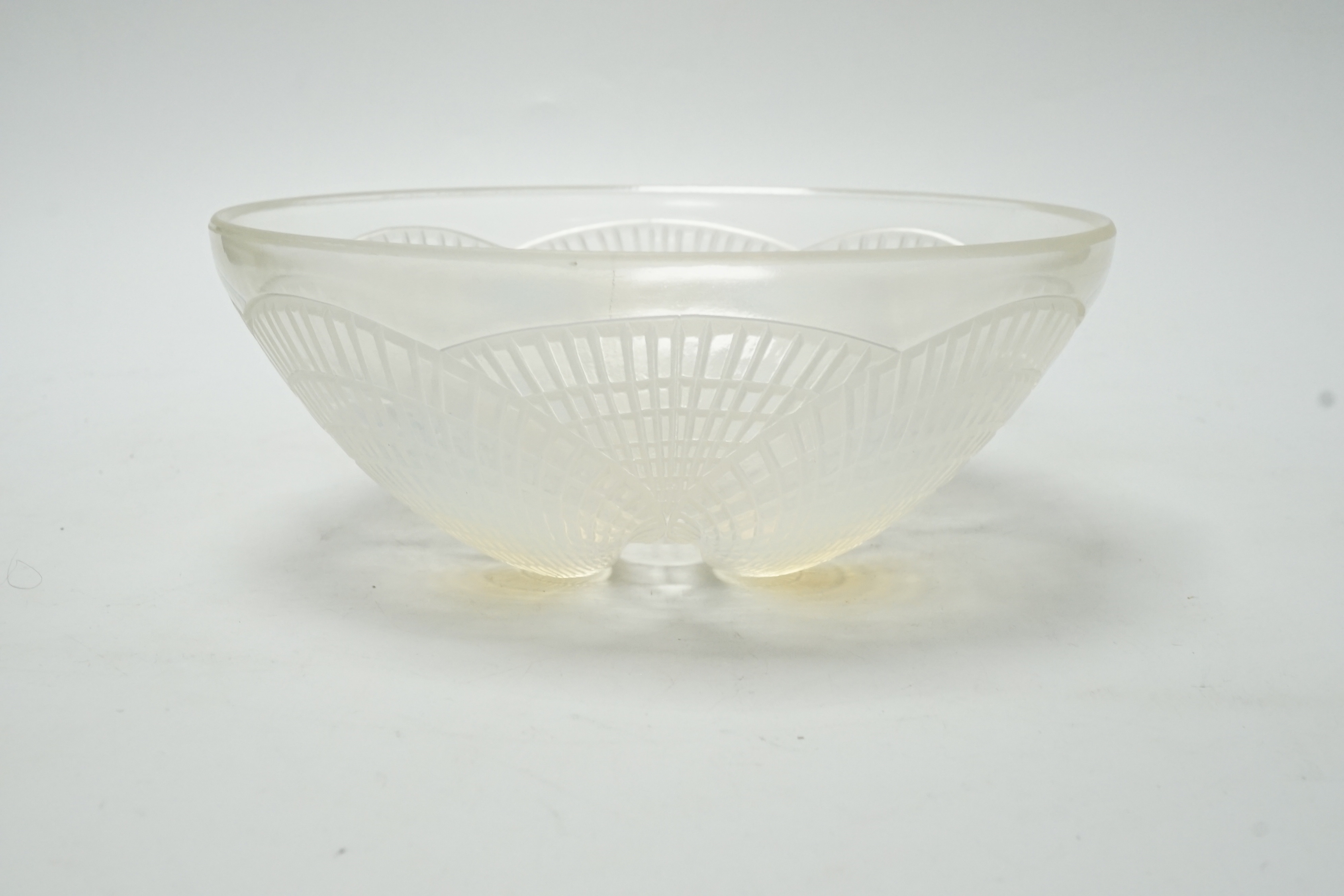 A Lalique opalescent glass Coquilles pattern bowl, moulded ‘’R. LALIQUE’’ mark, 21cm wide